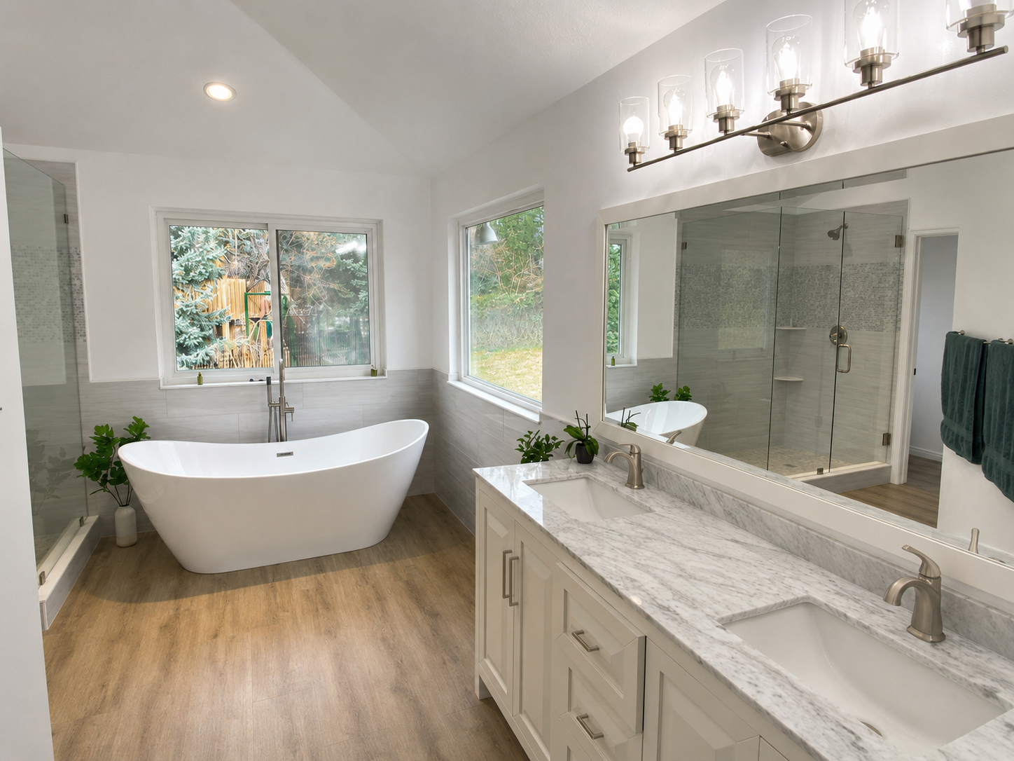 Bright primary bathroom with freshly painted white walls and ceiling